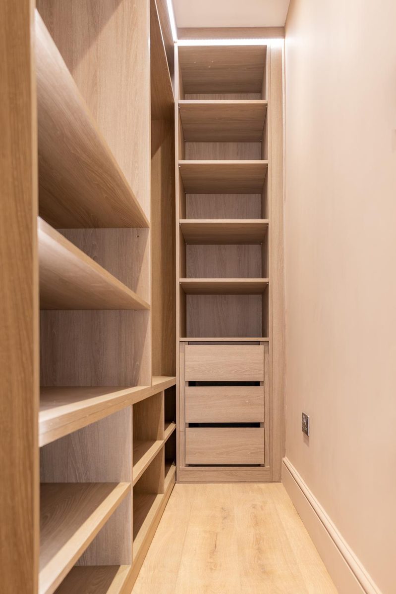 Oak wardrobe with shelving and drawer bank