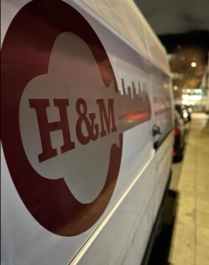 H&M Group van logo at night